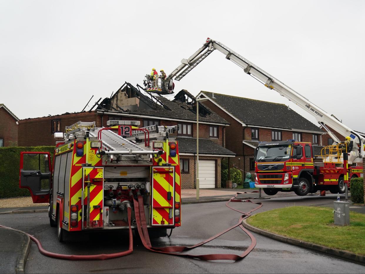 Fire crews from seven surrounding areas were sent to the scene and are now damping down the property (PA)