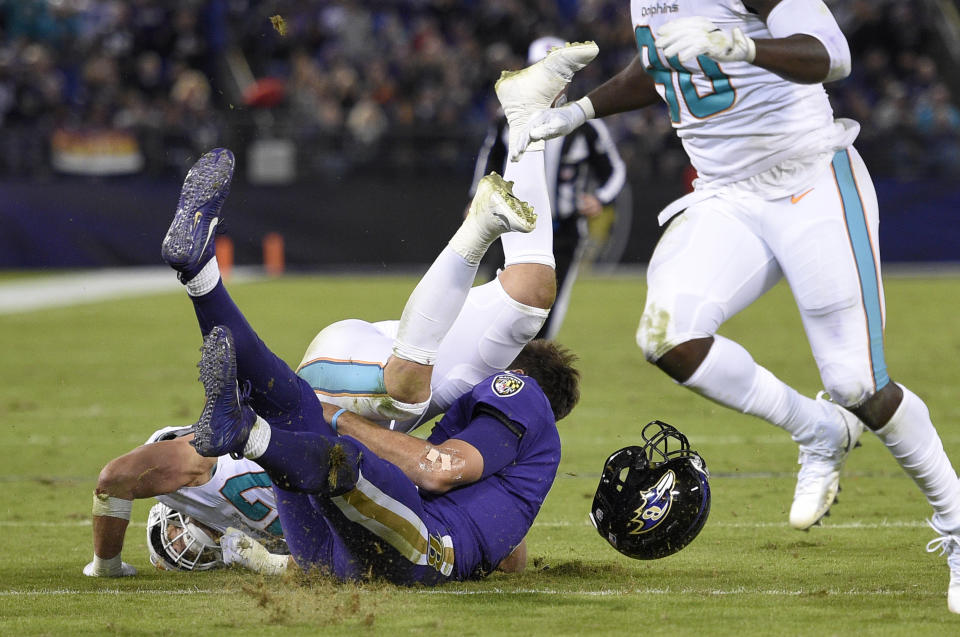 Miami Dolphins middle linebacker Kiko Alonso collided with Baltimore Ravens quarterback Joe Flacco in the first half last week in Baltimore. (AP)