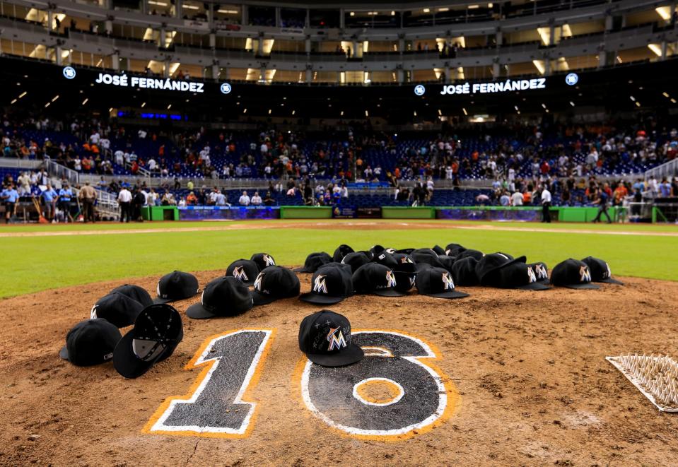 <p>Miami Marlins leave their hats on the pitching mound to honor the late Jose Fernandez after the game against the New York Mets at Marlins Park on September 26, 2016 in Miami, Florida. (Photo by Rob Foldy/Getty Images) </p>