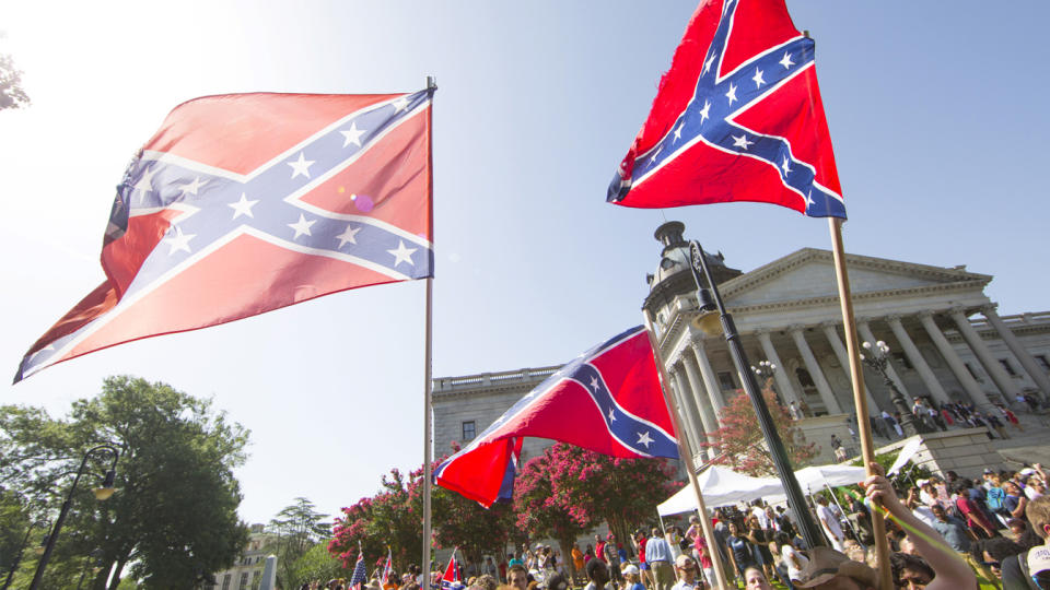 Confederate flag supporters argue their position after the Confederate battle flag was permanently removed from the South Carolina statehouse grounds during a ceremony in Columbia, South Carolina, July 10, 2015. (Jason Miczek/Reuters)