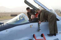 <p>North Korean leader Kim Jong Un sits in an airplane as he guides a flight drill for the inspection of airmen of the Korean People’s Army (KPA) Air and Anti-Air Force in this undated photo. (KCNA/Reuters) </p>