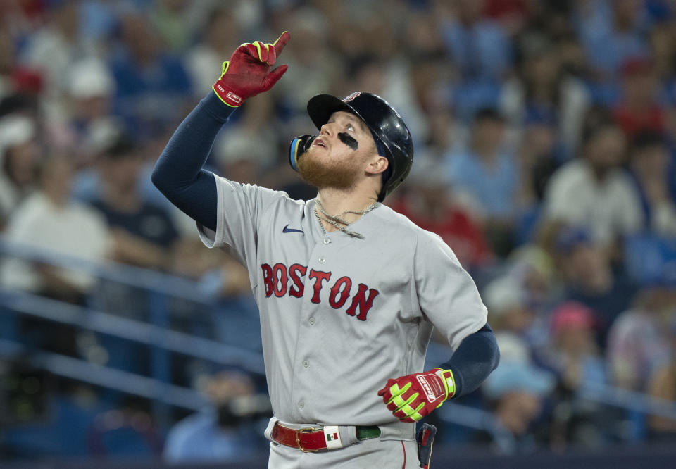 Boston Red Sox Alex Verdugo celebrates as he rounds the bases on his game winning solo homer during the ninth inning of a baseball game against the Toronto Blue Jays in Toronto, Sunday, July 2, 2023. (Frank Gunn/The Canadian Press via AP)