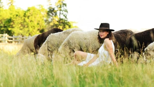 Pien Steinbusch, 19, is the new shepherd herding the flock of sheep in Fort Saskatchewan. (Keith Beck - image credit)