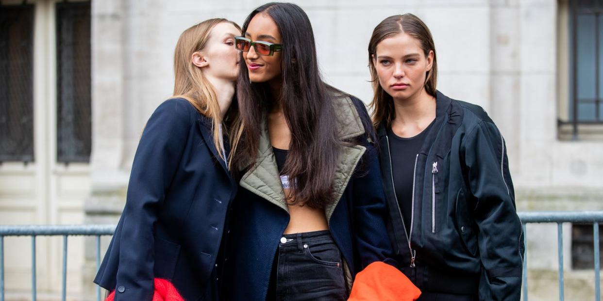 paris, france october 01 models seen whispering outside chanel during paris fashion week womenswear spring summer 2020 on october 01, 2019 in paris, france photo by christian vieriggetty images