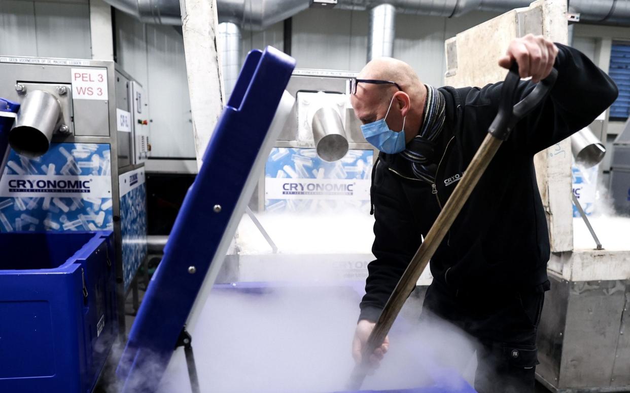 A dry ice container that will be used to transport the Covid-19 vaccine - Kenzo Tribouillard/AFP
