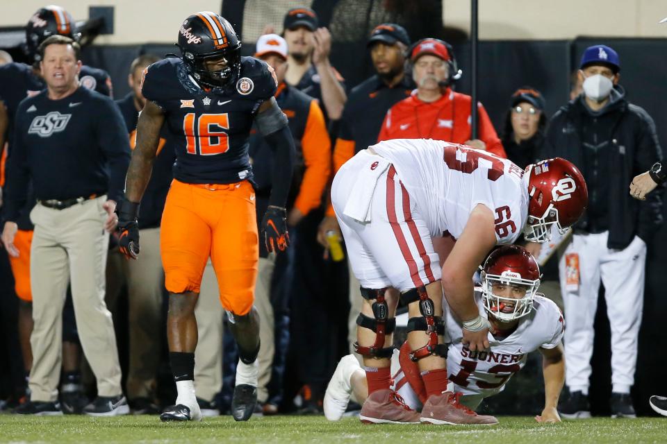 Oklahoma State linebacker Devin Harper (16) had 10 tackles and a quarterback sack in the Cowboys' 37-33 Bedlam victory over Oklahoma on Saturday