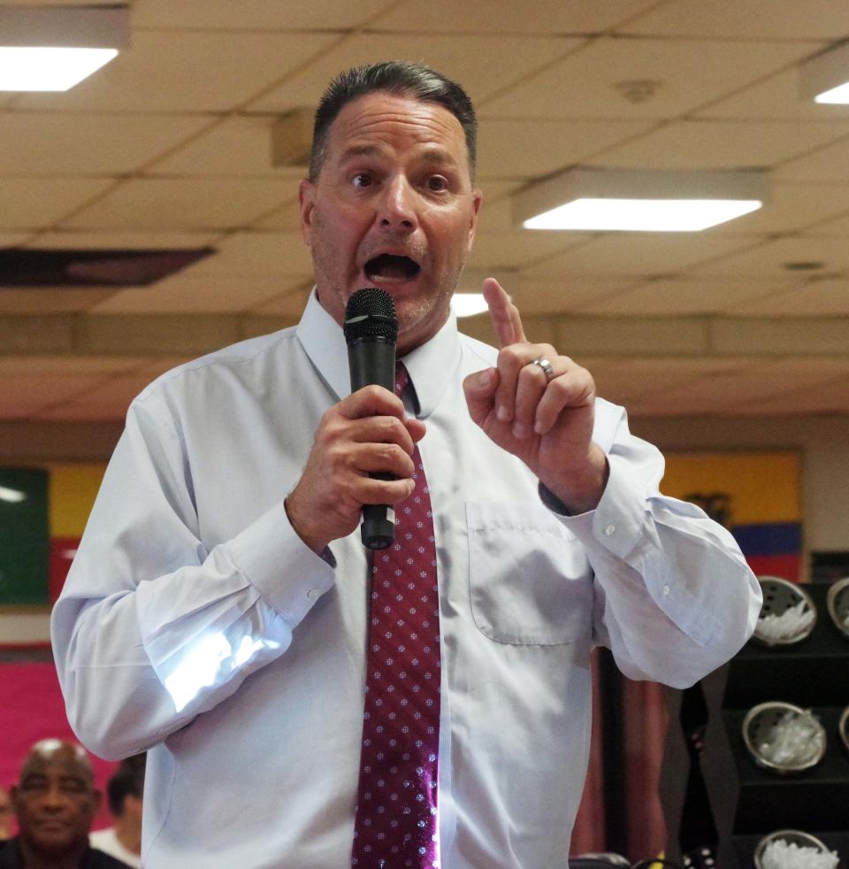 Brockton Schools Superintendent Michael Thomas responds to a parent during a School Committee Open Forum meeting held at the high school cafeteria on Tuesday, July 11, 2023.