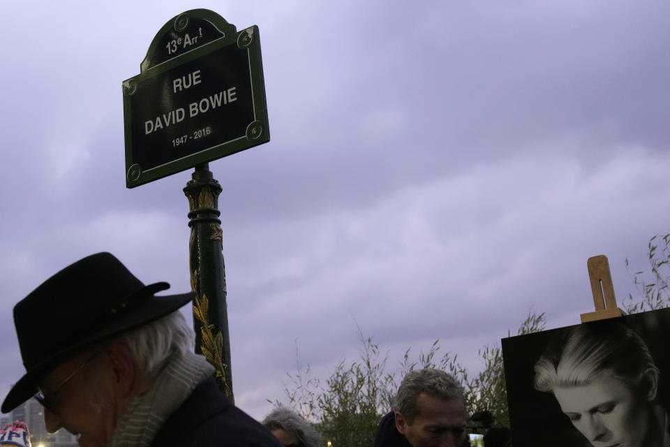 The street sign of singer David Bowie is pictured after being unveiled during a ceremony in Paris, Monday, Jan. 8, 2023. The city of Paris is immortalizing late British music icon David Bowie by naming a street after him in the city's southeast on what would have been his 77th birthday on Monday. (AP Photo/Christophe Ena)