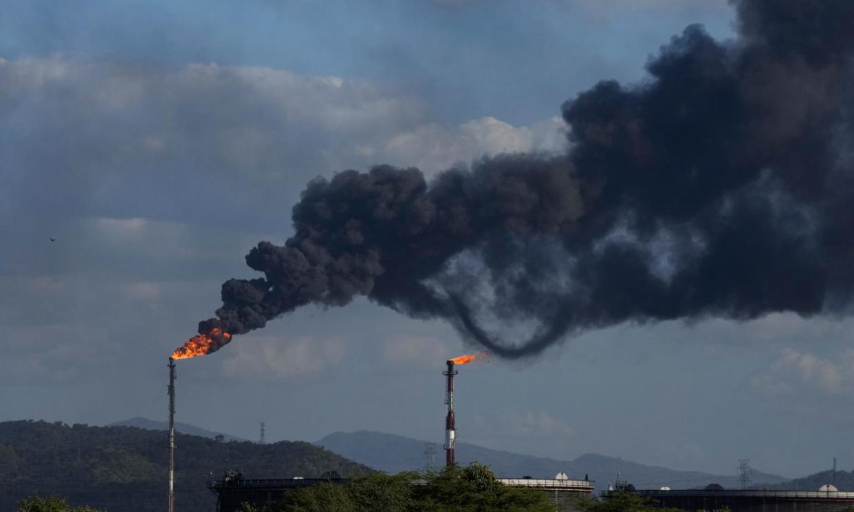 <span>A new report points toward subsidies for dirty industries as an obstacle for clean climate finance.</span><span>Photograph: Matias Delacroix/AP</span>