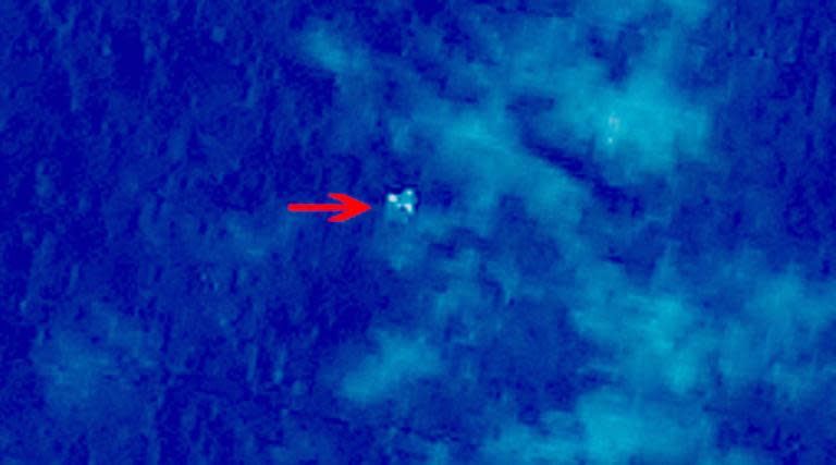 Satellite image showing objects in a "suspected crash sea area" in the South China Sea on March 9, 2014, pictured in this photo released by the State Administration of Science, Technology and Industry for the National Defence of China