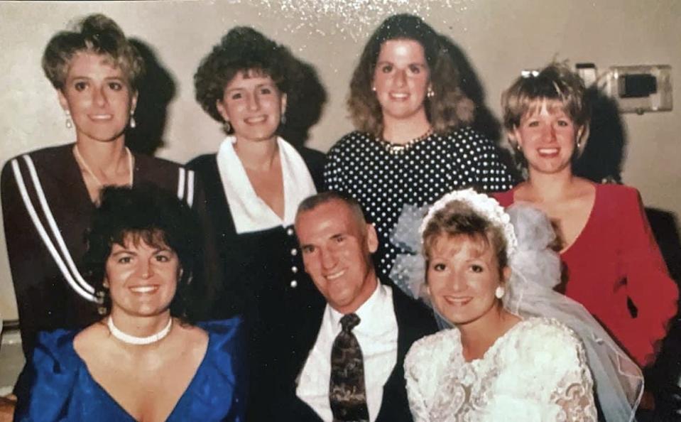 Former Boonsboro High School Principal Joe Robeson is surrounded by members of the Class of 1986 at the wedding of Stephanne Saunders, who stayed in touch with him for the rest of his life.
