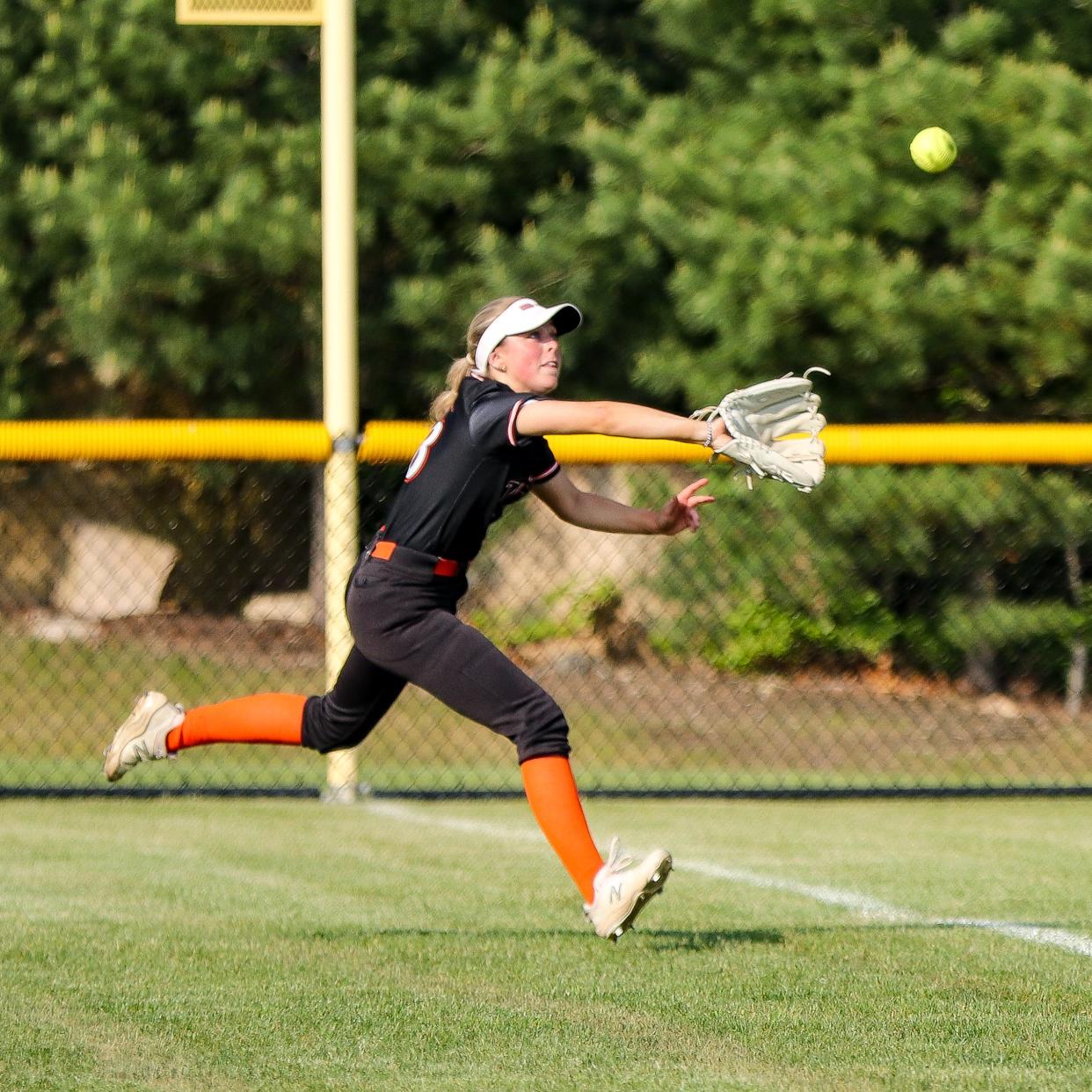 Oliver Ames' Paige Taylor runs to make a catch during a game against Foxboro on Monday, May 22, 2023.