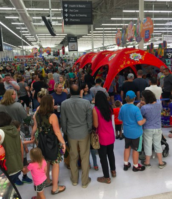 A crowd shows up to see YouTube star Ryan at a Walmart in Bentonville, Arkansas.