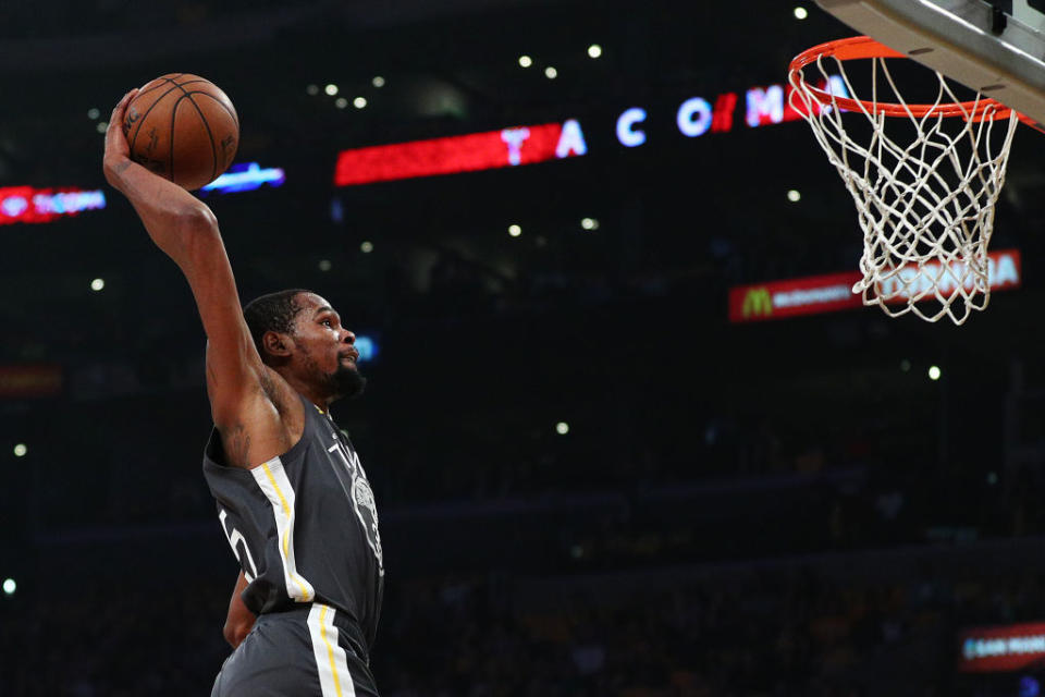 Kevin Durant #35 of the Golden State Warriors dunks the ball against the Los Angeles Lakers during the first half at Staples Center on April 4, 2019 in Los Angeles, California. | Yong Teck Lim—Getty Images