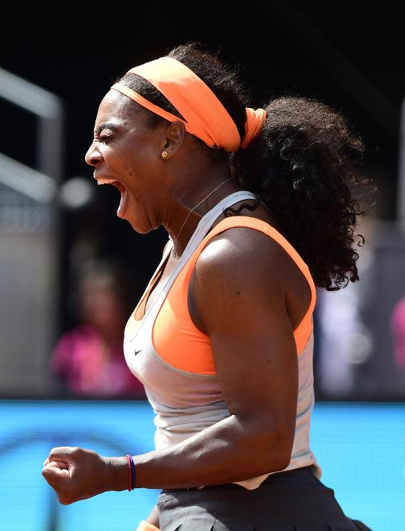 Serena Williams of the US celebrates her victory over Victoria Azarenka of Balarus during the Madrid Open, at the Caja Magica (Magic Box) sports complex, on May 6, 2015