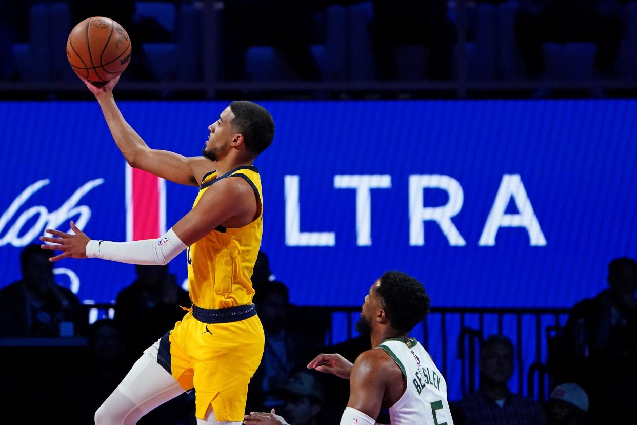 Dec 7, 2023; Las Vegas, Nevada, USA; Indiana Pacers guard Andrew Nembhard (2) shoots the ball against Milwaukee Bucks guard Malik Beasley (5) during the first quarter in the NBA In Season Tournament Semifinal at T-Mobile Arena. Mandatory Credit: Kyle Terada-USA TODAY Sports