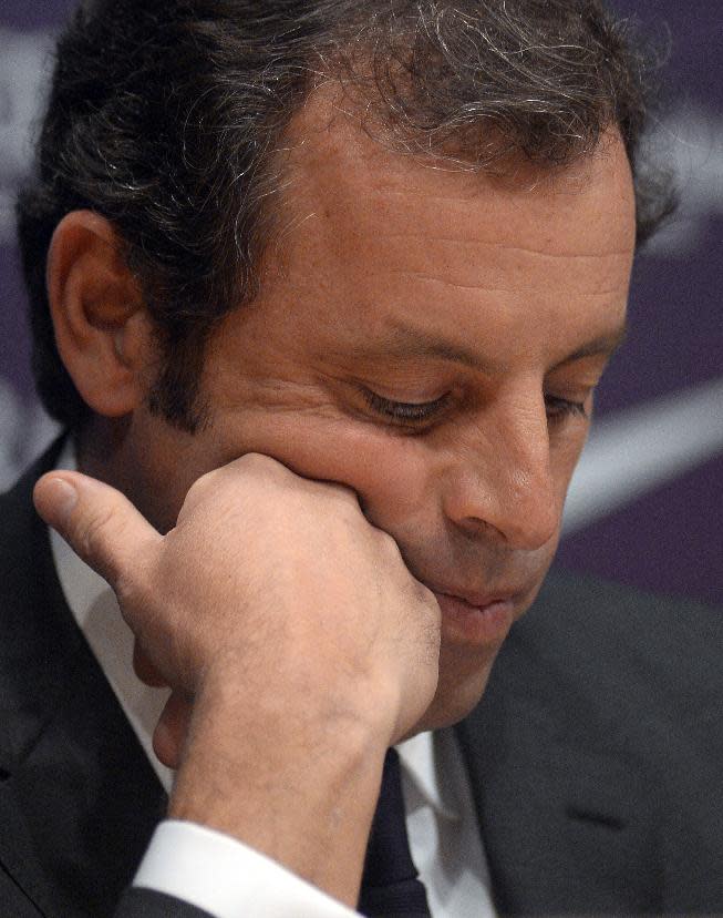 FC Barcelona's president Sandro Rosell, looks down during a press conference at the Camp Nou stadium in Barcelona, Spain, Thursday, Jan 23, 2014. Sandro Rosell is stepping down as president of Barcelona a day after a judge agreed to hear a lawsuit accusing him of allegedly hiding the cost of the transfer of Brazil striker Neymar. Rosell says he is resigning after an emergency meeting with Barcelona's board of directors on Thursday. Rosell says vice president Josep Bartomeu will take his place as president and finish the term that expires in 2016. Elected in 2010 to replace outgoing president Joan Laporta, Rosell said last April he planned to run for re-election in 2016. (AP Photo/Manu Fernandez)