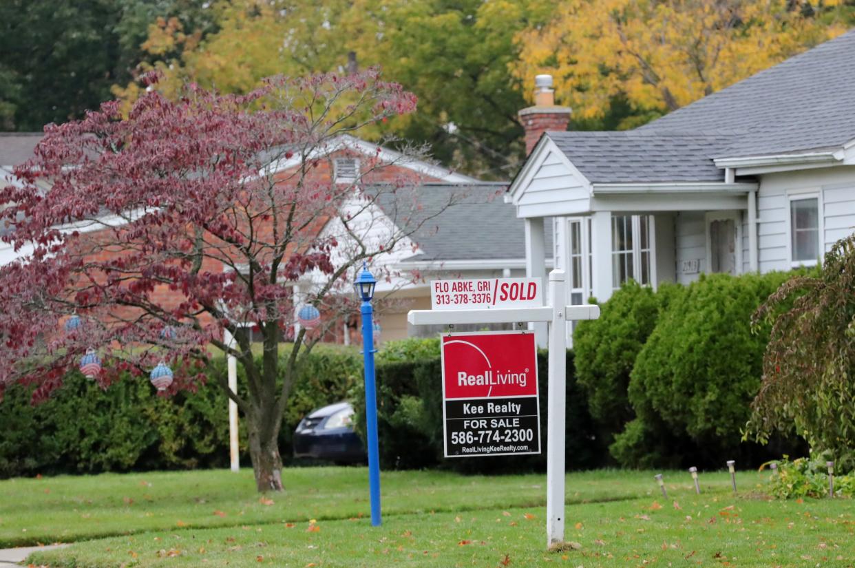 A for sale sign is seen in St. Clair Shores on Monday, October 19, 2020.