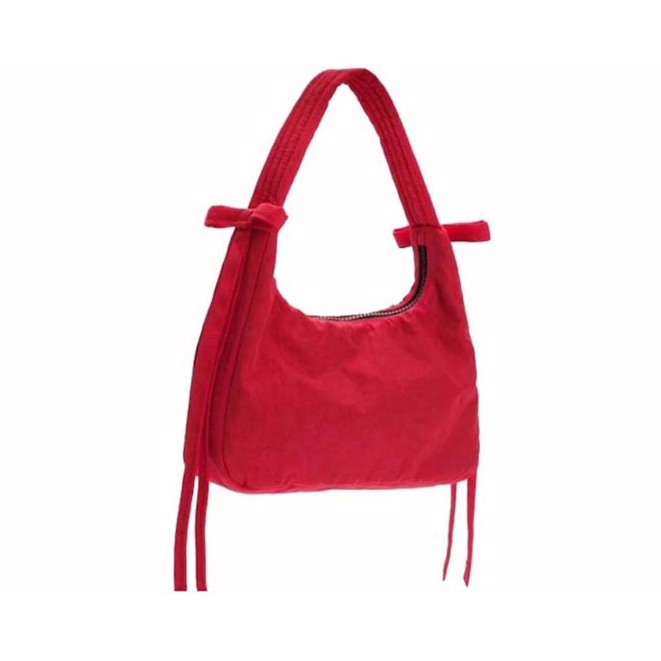 <p><a href="https://go.redirectingat.com?id=74968X1596630&url=https%3A%2F%2Fstockx.com%2Fbaggu-x-sandy-liang-mini-bow-bag-candy-apple&sref=https%3A%2F%2F" rel="nofollow noopener" target="_blank" data-ylk="slk:Shop Now;elm:context_link;itc:0;sec:content-canvas" class="link ">Shop Now</a></p><p>Mini Bow Bag</p><p>stockx.com</p><p>$62.00</p>