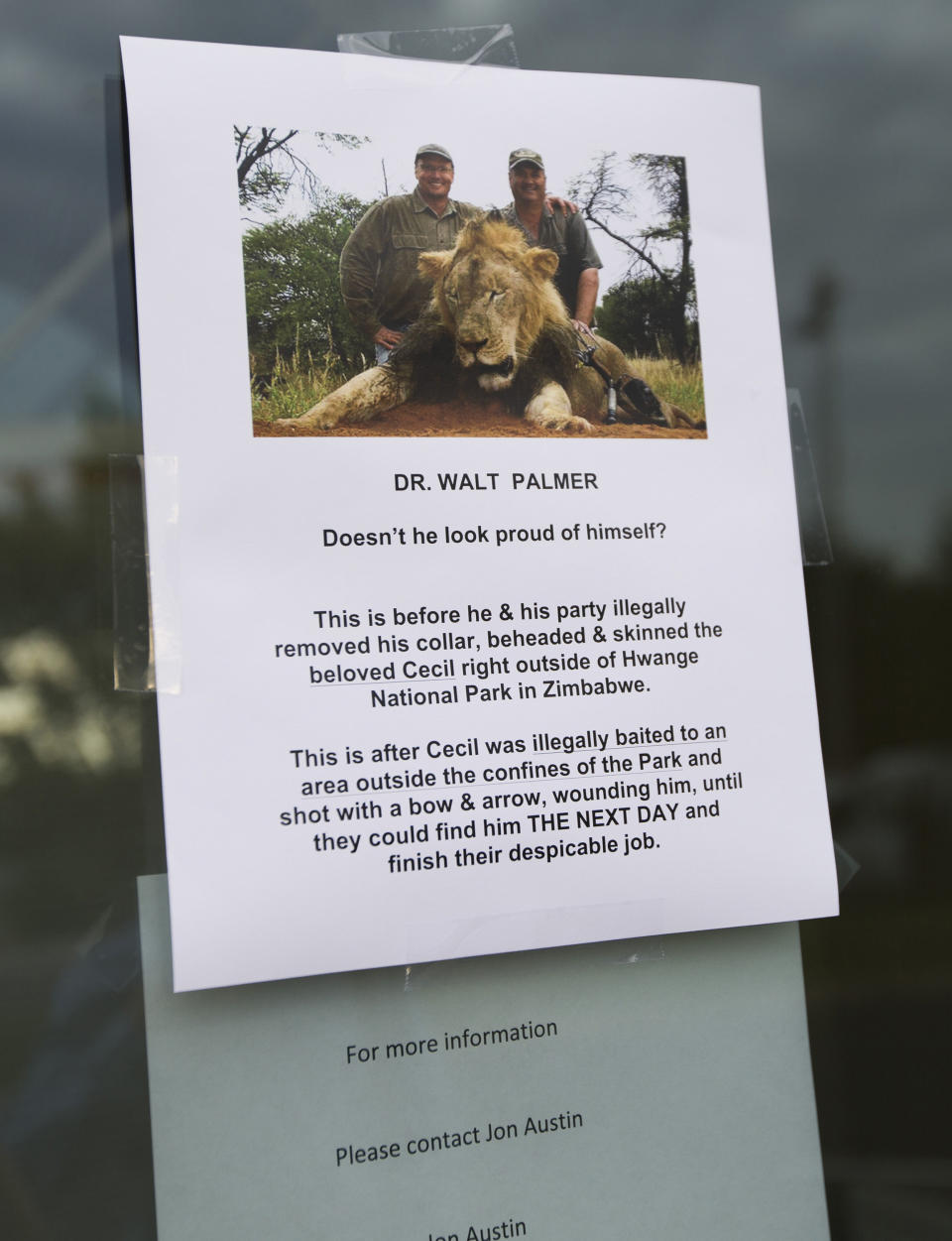 <p>A sign posted on the door of Walter Palmer's dental practice on July 28, 2015.</p> (Photo: Credit: Renee Jones Schneider/Minneapolis Star Tribune/TNS/Getty Images)