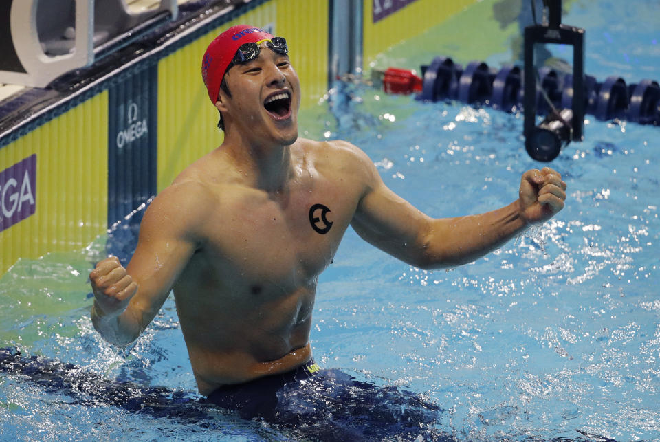 Daiya Seto celebrates after his swim in the the men's 400-meter individual medley during an International Swimming League event Friday, Dec. 20, 2019, in Las Vegas. (AP Photo/John Locher)