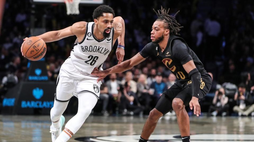 Mar 23, 2023;  Brooklyn, New York, USA;  Brooklyn Nets guard Spencer Dinwiddie (26) moves the ball against Cleveland Cavaliers guard Darius Garland (10) in the third quarter at Barclays Center.  Mandatory Credit: Wendell Cruz-USA TODAY Sports