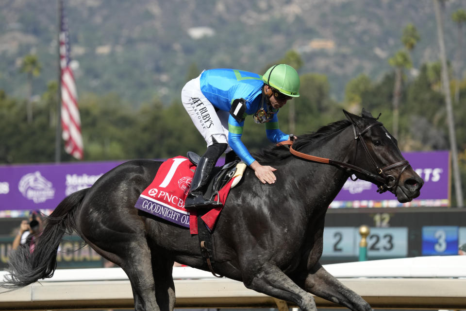 Irad Ortiz Jr. pats Goodnight Olive after winning the Breeders' Cup Filly and Mare Sprint horse race Saturday, Nov. 4, 2023, at Santa Anita Park in Arcadia, Calif. (AP Photo/Ashley Landis)