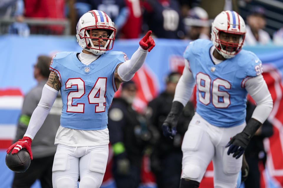 Tennessee Titans cornerback Elijah Molden (24) celebrates his touchdown against the Houston Texans during the first half of an NFL football game, Sunday, Dec. 17, 2023, in Nashville, Tenn. (AP Photo/George Walker IV)