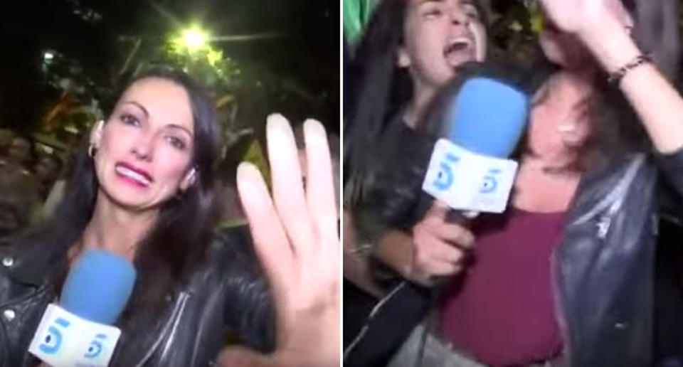 Telecinco reporter Laila Jiménez is harassed preparing for a cross on the proposed Catalonia referendum in Barcelona.