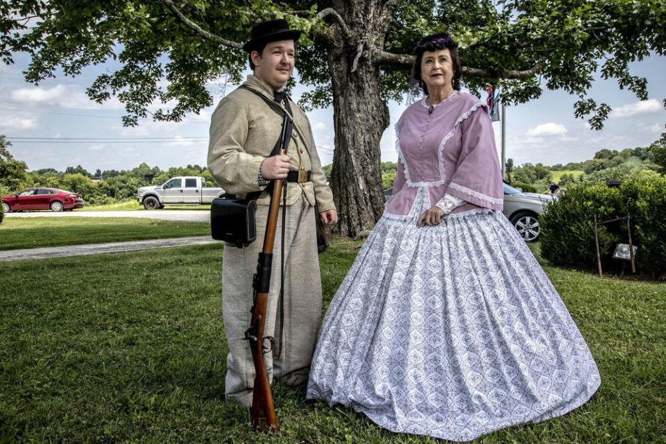 Reenactors of confederate soldiers and wives attend the dedication of the National Confederate Museum in Elm Springs in Columbia, Tenn. on July 20.