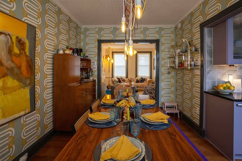 Wallpapered dining room.