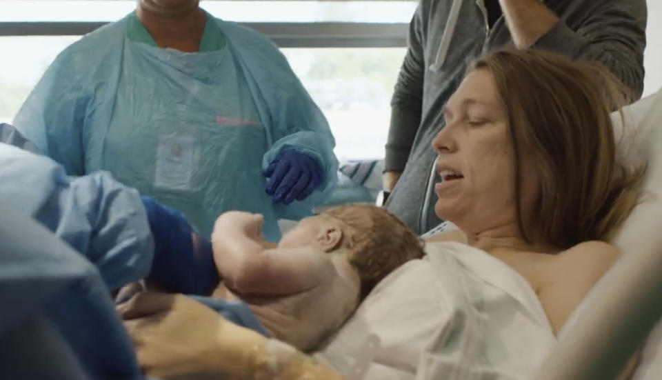 In this image taken from a campaign video posted by Katie Darling, Darling holds her newborn son moments after giving birth. Darling said she was seven months pregnant when she decided to join Louisiana’s U.S. House race in reaction to the U.S. Supreme Court ruling in June 2022 that ended constitutional protections for abortion. (Courtesy of Katie Darling via AP)