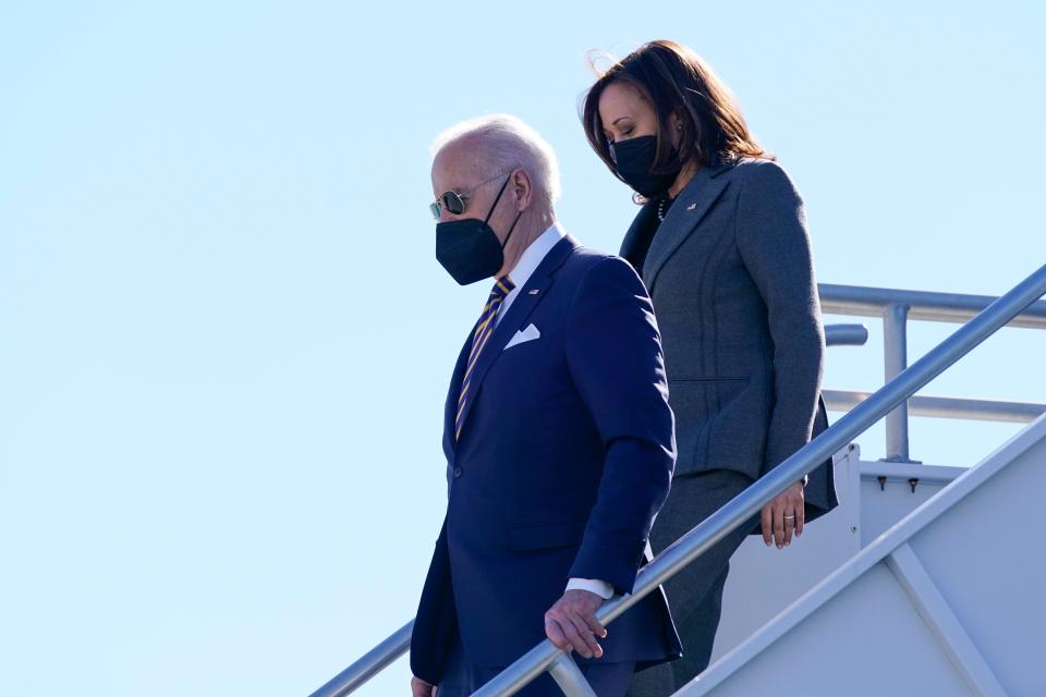 President Joe Biden and Vice President Kamala Harris step off Air Force One, Tuesday, Jan. 11, 2022, at Hartsfield-Jackson Atlanta International Airport in Atlanta.