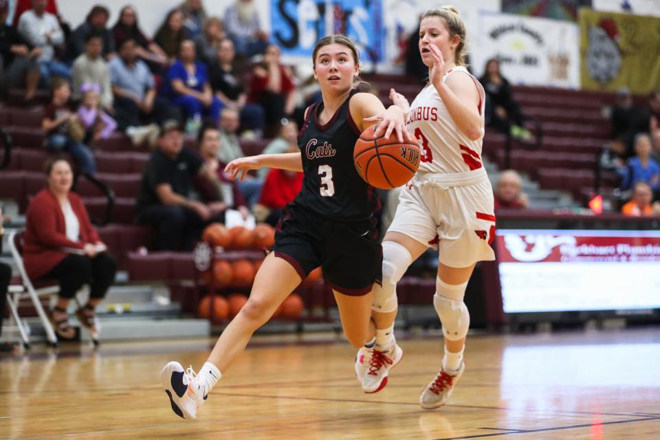 Calallen's Karlie Haigood (3) dribbles toward the hoop in a high school basketball game against Columbus at Calallen High School on Thursday, Dec. 1, 2022 in Corpus Christi, Texas.