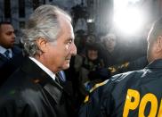 FILE PHOTO: Bernard Madoff departs US Federal Court after a hearing in New York