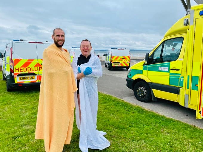 PC Dean Greenslade and PC John Curry rescued a man from the sea (Picture: South Wales Police)