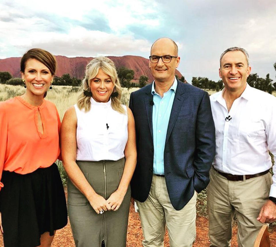 Sunrise personalities Nat Barr, Sam Armytage, David 'Kochie' Koch and Mark Beretta pose in front of Uluru