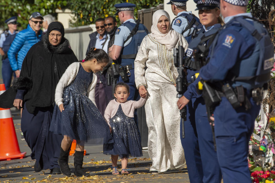 Under tight police security, families arrive for Britain's Prince William visit to the Al Noor mosque, one of the two involved in the mass shootings, in Christchurch, New Zealand, Friday, April 26, 2019. Prince William visited one of the two Christchurch mosques where 50 people were killed and 50 others wounded in a March 15 attack by a white supremacist. (David Alexander/SNPA via AP)