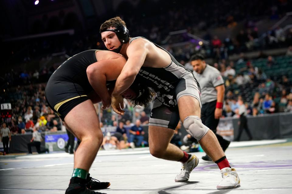 Joseph Abill of Clifton, right, wrestles Matthew Murray of Paramus Catholic in a 215-pound bout on day one of the NJSIAA state wrestling tournament in Atlantic City on Thursday, March 2, 2023.