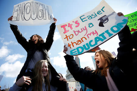 Students from Washington, DC-area schools protest for stricter gun control during a walkout by students at the U.S. Capitol in Washington, U.S., March 14, 2018. REUTERS/Joshua Roberts