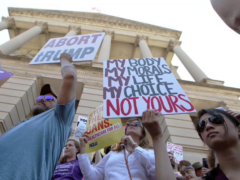 Rape survivors in the US are being denied abortions due to financial barriers, “invasive” police intervention and a dearth of abortion providers, campaigners have warned.Abortion rights activists argued that the procedure is already very difficult to access for huge numbers of Americans – particularly people of colour and those on a low wage.Abortion opponents across the US have become increasingly emboldened in their efforts to roll back women’s reproductive rights since Donald Trump entered the White House in January 2016. Legislation to restrict abortion rights has been introduced in 16 states this year.Oriaku Njoku, the executive director of an organisation based in Georgia which helps low-income women access abortion, said the organisation had encountered women who were wanting to get their pregnancy terminated due to it being the product of rape.“You can use medicated funds in cases rape and incest but there is a lot of bureaucracy so it is hard to get it. Most people opt not to do that. You have to have a police report. It is too complicated. People do not have time to wait for all this paperwork," said Ms Njoku, who is also the co-founder of Atlanta-based Access Reproductive Care-Southeast, which works in six different states in the south of America.“After you have had an abortion, they test to see who the father is with DNA testing. It is a whole process. The police have to go to the hospital to get products of conception. It is really invasive. We come across people choosing not to do this a lot.“There is also the problem that women who are rape survivors can’t afford it and they do not know where to go. They could be living with their abuser or rapist. Or not feeling like they have the support. They could be talking to someone who has this twisted mindset. People are shamed or coerced into carrying their pregnancy to full term.”Ms Njoku’s comments came after Georgia governor Brian Kemp signed the controversial “heartbeat” abortion ban into law this month – giving the southern state one of the most restrictive laws in the US.The legislation, which has provoked outrage among women’s rights groups, bans abortion once cardiac activity can be detected in an embryo. This can be as early as six weeks – at which point many women do not yet know they are pregnant. The bill imposes jail sentences for women found guilty of aborting or attempting to abort their pregnancies, with the potential for life imprisonment and the death penalty. It is not scheduled to come into effect until 1 January and is expected to face challenges in the courts – and potentially be postponed. Anti-abortion activists hope challenges will lead to the US Supreme Court reversing Roe vs Wade – the landmark Supreme Court decision that legalised abortion nationwide in 1973 – especially with new conservative justices Neil Gorsuch and Brett Kavanaugh sitting on the court.Ms Njoku argued that a lack of trust towards the police among black communities due to police brutality also led to people choosing not to report instances of sexual assault and therefore not being able to access abortion. She noted that some women might not even be able to access abortion, despite having become pregnant through incest.She said the cost of getting an abortion in the US – where healthcare is privatised and a national health service does not exist – varies from state to state but can quickly skyrocket the further a woman moves along in her pregnancy.Ms Njoku said: “It is about $500 for a first-trimester abortion but the price goes up every week. The most expensive I’ve seen is $22,000 for a later term abortion. She was around 24 weeks along. But people barely even have $500. Folks barely have savings when they are living paycheck to paycheck. There is also a pay gap between women of colour and white women.“Roe v Wade made abortion legal but not acceptable for people in many communities in the US. Rural people, low-income people, and people of colour struggle to access abortion. They are struggling every day and then you add on the unexpected cost of an abortion. It’s always been bad here. In Mississippi, there is only one abortion provider. There are three independent abortion providers in Alabama."We have been seeing independent abortion clinics closing every year due to a lack of funding and all the restrictions placed.”The campaigner’s organisation, Access Reproductive Care-Southeast, which carries out its work in Tennessee, South Carolina, Georgia, Alabama, Florida and Mississippi, provides financial support, logistical help and advice around abortion.“We drive them to get abortions, we help provide someone to watch their kids, we give them somewhere to stay out of state. We try to do what we can to eliminate barriers,” she added.The campaigner said women who lived in rural communities often struggled to access abortions due to not having internet access or having a poor internet connection. This was often compounded, she said, by women not having any friends or family they can confide in who are in favour of abortion and therefore not having anyone who would be willing to drive them on what could be a four-hour journey to an abortion clinic or a two-hour drive to a bus stop. They came across a woman in the south of Georgia who was not able to get anyone she knew to drive her to Atlanta for an abortion due to them objecting to the procedure – with it taking her a total of two weeks to find childcare and a lift. She had already been to the coastal city of Savannah but had been refused an abortion due to being too far along.Ms Njoku said anti-abortion activists were “trying everything” to reverse women’s abortions rights – adding that they were just “throwing spaghetti at the wall and seeing what sticks”. She added: “They feel emboldened because they feel they have support from administration. Even the fear that is being created is starting to be a barrier to care for people. People have been calling our hotline thinking they would have to travel from Georgia to another state. Some people are scared and ask if they should cancel their appointment. “We are reassuring people they can stay inside their home state. There is no other type of healthcare where people have to go through hoops and obstacles to access basic healthcare. If they are going to overturn Roe, abortions are not going to stop. No matter what, we are going to be here to provide for our community.”Ms Njoku, whose organisation is run and led by black people living in the south, said she had encountered racism from anti-abortion activists while carrying out her work – with people asking “don’t black lives matter” as she goes into clinics and offering to adopt women’s babies.More than a dozen other states have passed or are considering versions of Georgia’s law. Kentucky, Mississippi and Ohio have also approved bans on abortion once a foetal heartbeat is detected. Alexa Kolbi-Molinas, an American Civil Liberties Union lawyer, said: “There are already large swathes of this country and thousands of people for whom the right to have an abortion is just an illusion. Since 2011, politicians have passed more than 400 medically unnecessary and politically motivated restrictions. These laws affect people of colour, people struggling financially and young people. It is important to keep the focus on what is the reality for women already.”She will be challenging Alabama’s new law mandating a near total ban on abortion which the governor signed into law last week. Under the law, doctors would face 10 years in prison for attempting to terminate a pregnancy and 99 years for carrying out the procedure. The abortion ban, which has been branded a “death sentence for women”, would even criminalise performing abortions in cases of rape and incest.