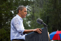 <b>July 14, 2012:</b> "The President delivers remarks in the pouring rain at a campaign event in Glen Allen, Va. He was supposed to do a series of press interviews inside before his speech, but since people had been waiting for hours in the rain he did his remarks as soon as he arrived onsite so people." (Official White House Photo by Pete Souza)