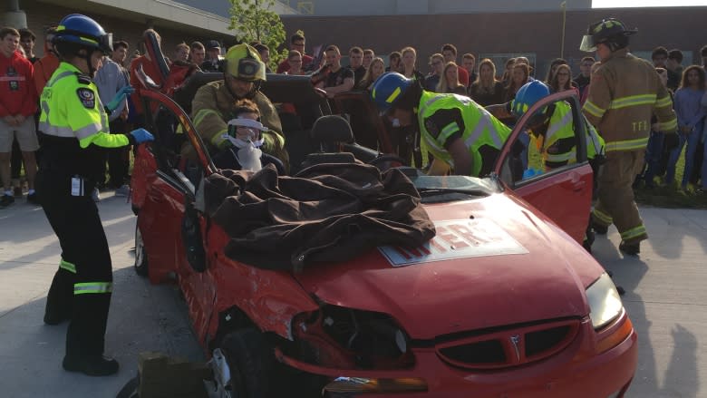 Mock accidents show impact of distracted driving first hand