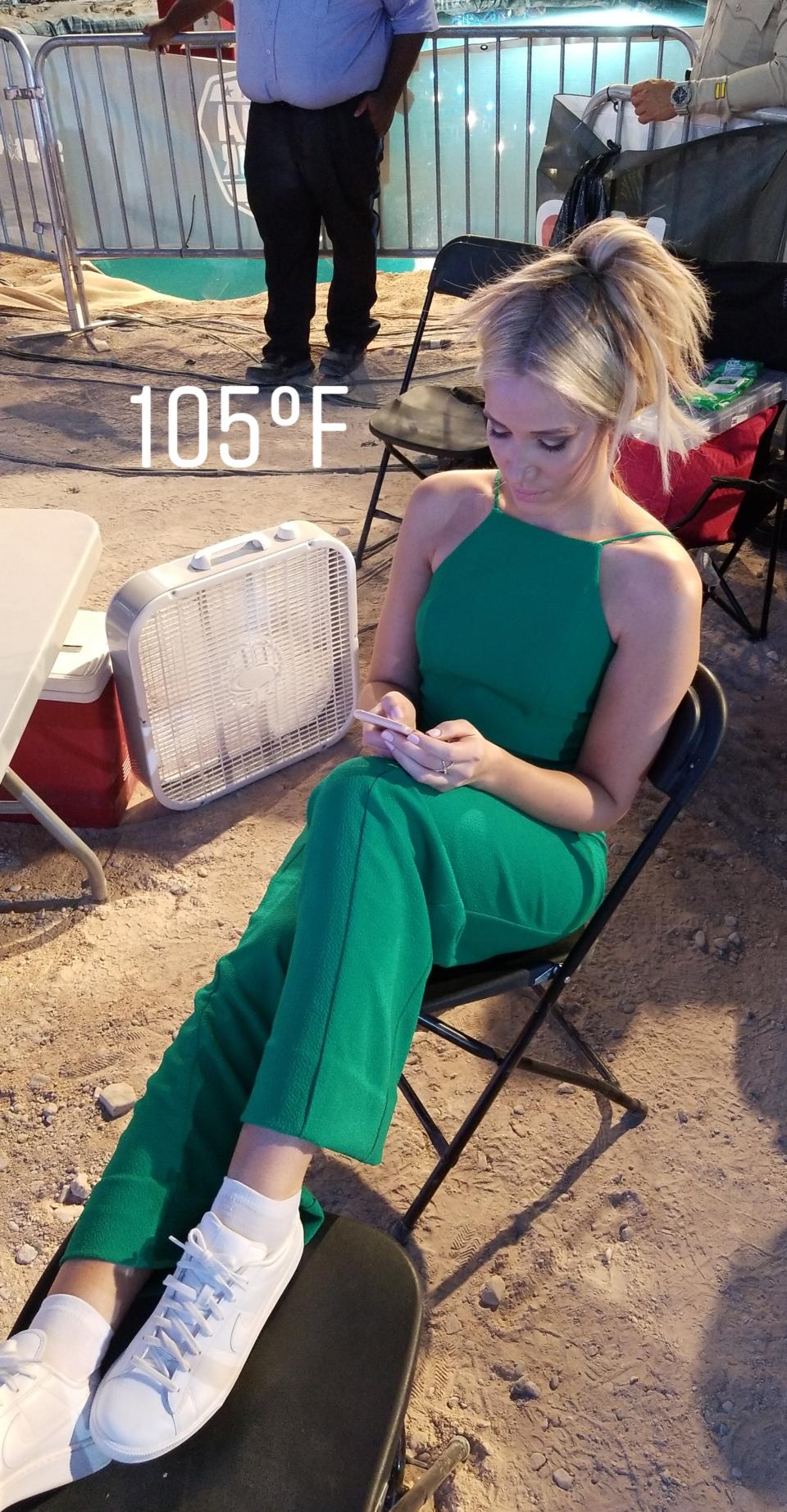 <p>Just doing a little email and temperature check during a break – Yes it was still 105 degrees at midnight. — @kristineleahy </p>