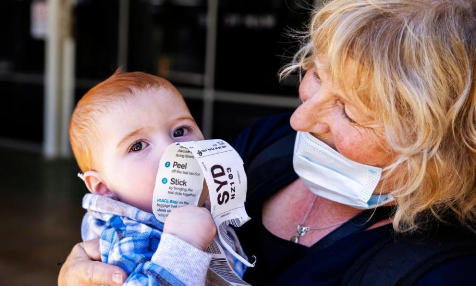 Dianne Wright hugs grandson Mason Buckley at Sydney International Airport