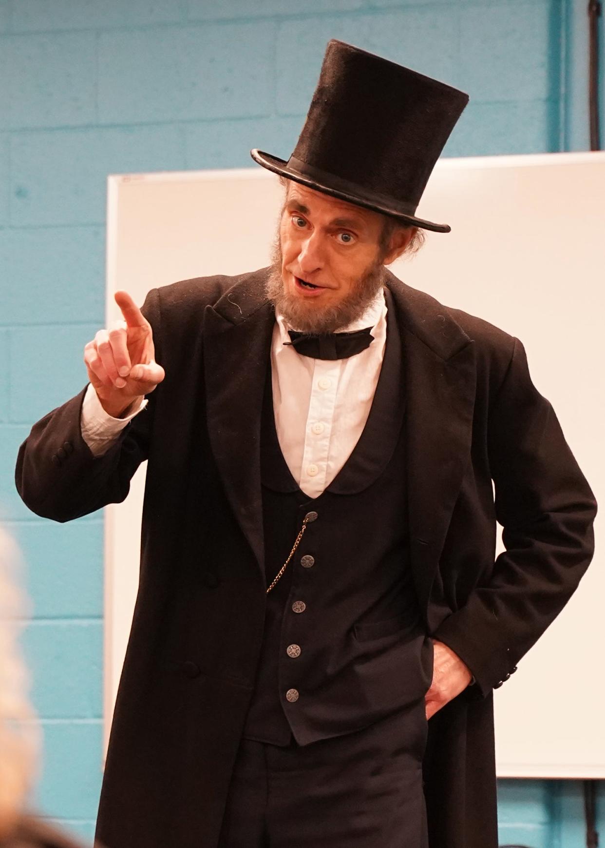 Abraham Lincoln impersonator Kevin Wood, of Adrian appeared March 30, 2023, as the former president of the United States during a historical talk and visit at the main branch of the Lenawee District Library in Adrian.