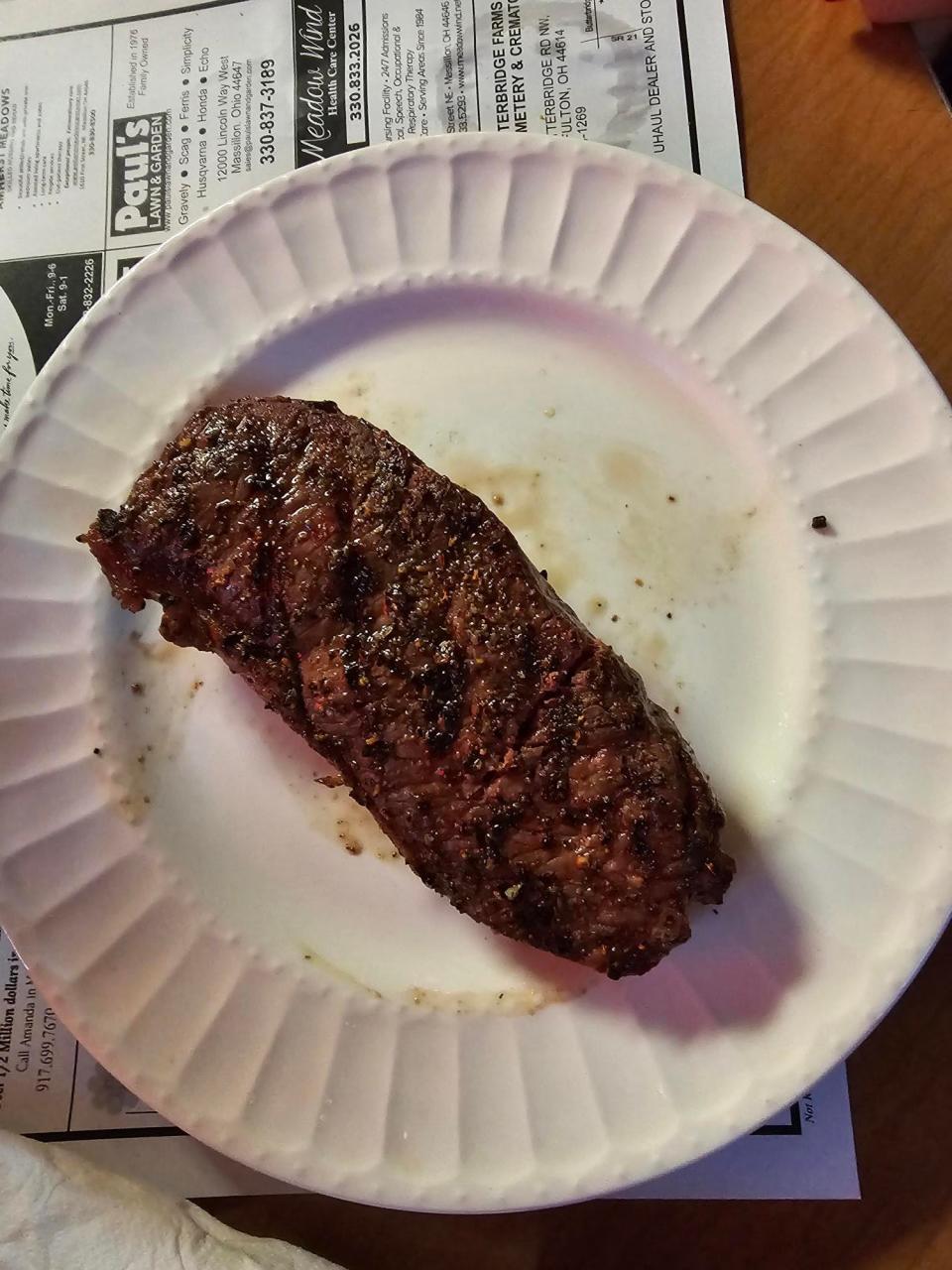 The 12-ounce Angus strip steak was cooked to perfection. The kitchen staff grills many of its entree meats on a gas grill behind the building.