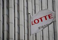 A flag bearing the logo of Lotte Hotel flutters at a Lotte Hotel in Seoul, South Korea, March 25, 2016. REUTERS/Kim Hong-Ji/File Photo