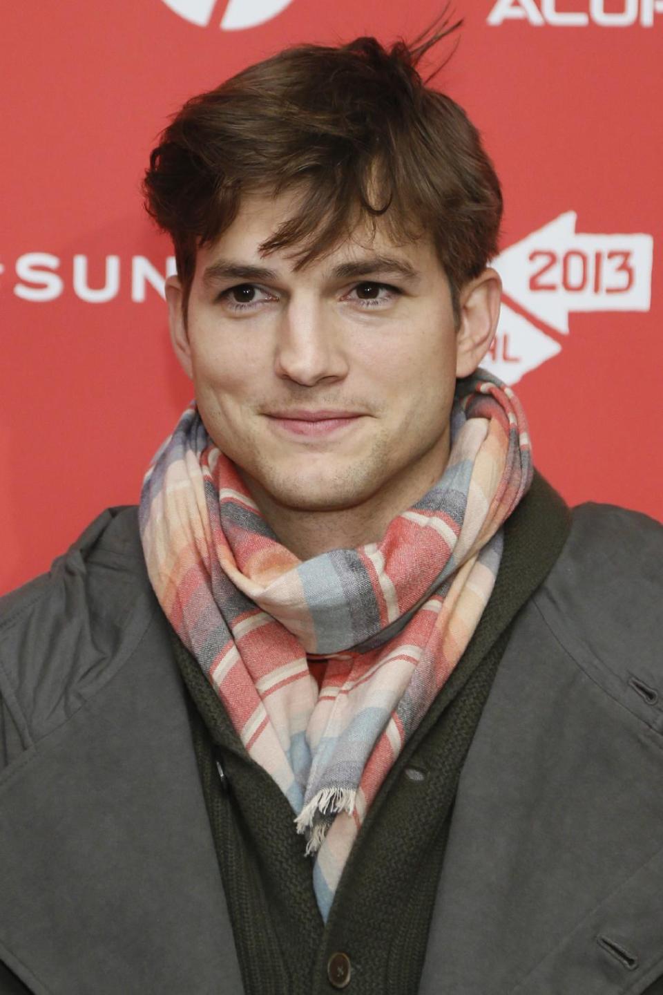 File - In this Jan. 25, 2013 file photo, actor Ashton Kutcher, who portrays Apple's Steve Jobs in the film "jOBS," poses at its premiere during the 2013 Sundance Film Festival, in Park City, Utah. Los Angeles prosecutors say a 12-year-old boy admitted Monday, March 11, 2013, to making prank 911 calls that drew a large police response to Kutcher's home last year. The boy, who has not been publicly identified, will be sentenced at a later date. (Photo by Danny Moloshok/Invision/AP, File)