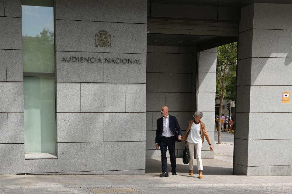 The former president of Spain's soccer federation Luis Rubiales, left, leaves after testifying at the National Court in Madrid, Spain, Friday, Sept. 15, 2023. Spanish state prosecutors formally accused Rubiales last week of alleged sexual assault and an act of coercion after Rubiales kissed Spain forward Jenni Hermoso during the awards ceremony after Spain beat England to win the title on Aug. 20 in Sydney, Australia. (AP Photo/Manu Fernandez)